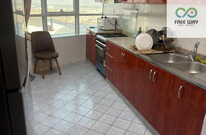 Apartment - 1 - 2 for sale in Orient Towers - Al Bustan - Ajman