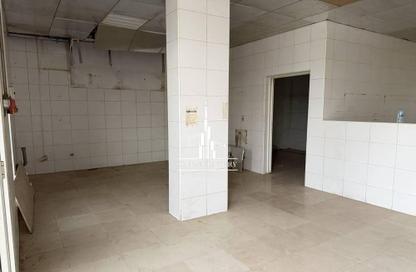 Shop - Studio - 1 Bathroom for rent in Building L12 - Greece Cluster - International City - Dubai