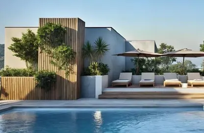 Apartment - 1 Bedroom - 2 Bathrooms for sale in Brand Centro - Jumeirah Garden City - Al Satwa - Dubai