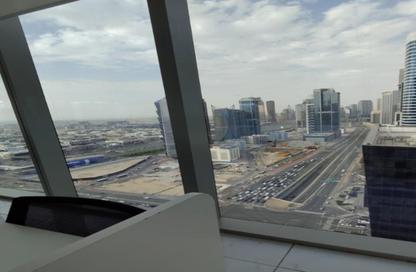 Office Space - Studio - 2 Bathrooms for rent in The Prism - Business Bay - Dubai