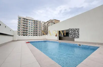 Apartment - 1 Bedroom - 2 Bathrooms for rent in Almond Tower - Garden City - Ajman