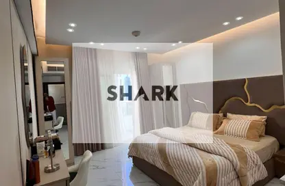 شقة - غرفة نوم - 2 حمامات للبيع في أورينت تاور 1 - أورينت تاور - البستان - عجمان