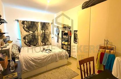 Apartment - 3 - 4 for sale in Tower 21 - Al Reef Downtown - Al Reef - Abu Dhabi