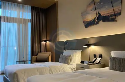 النزل و الشقق الفندقية - 1 حمام للبيع في فندق ومساكن برج باراماونت - الخليج التجاري - دبي