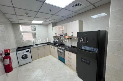 Apartment - 1 - 1 for sale in Uniestate Millennium Tower - Dubai Silicon Oasis - Dubai