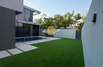 Villa - 4 Bedrooms - 6 Bathrooms for sale in Robinia - Masaar - Tilal City - Sharjah