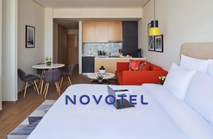 Apartment - Studio - 1 Bathroom for rent in Novotel Jumeirah Village Triangle - Jumeirah Village Triangle - Dubai
