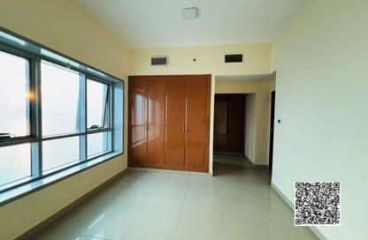 Apartment - 2 Bedrooms - 2 Bathrooms for sale in Corniche Tower - Ajman Corniche Road - Ajman