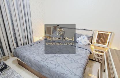 شقة - غرفة نوم - 2 حمامات للبيع في أورينت تاور 1 - أورينت تاور - البستان - عجمان