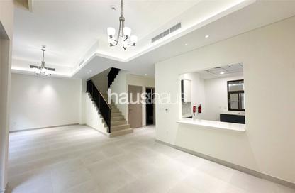 Townhouse - 4 - 4 for rent in Sevilla Village - Victory Heights - Dubai Sports City - Dubai
