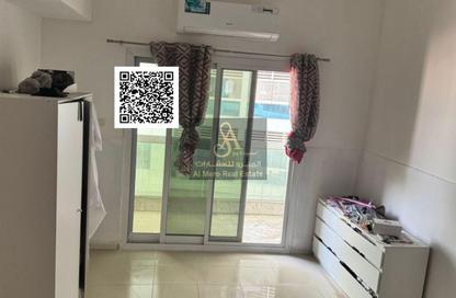Apartment - 1 Bedroom - 2 Bathrooms for sale in Tower C1 - Ajman Pearl Towers - Ajman Downtown - Ajman