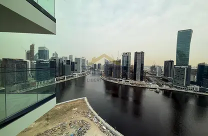 شقة - غرفة نوم - 1 حمام للايجار في بنينسولا ثري - بنينسولا - الخليج التجاري - دبي