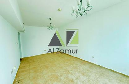Apartment - 1 Bedroom - 2 Bathrooms for rent in Ahmed Al Murr Building - Dubai Silicon Oasis - Dubai