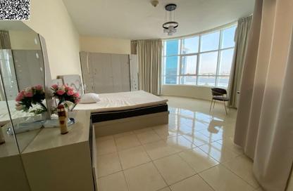 Apartment - 1 Bedroom - 2 Bathrooms for rent in Orient Tower 1 - Orient Towers - Al Bustan - Ajman