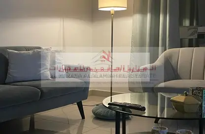 شقة - غرفة نوم - 2 حمامات للايجار في برج منازل 5 - شارع التعاون - التعاون - الشارقة