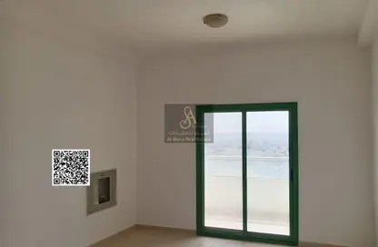 Apartment - 1 Bedroom - 2 Bathrooms for sale in Smart Tower 1 - Al Amerah - Ajman