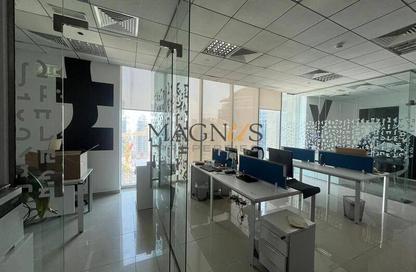 Office Space - Studio - 1 Bathroom for rent in The Prism - Business Bay - Dubai
