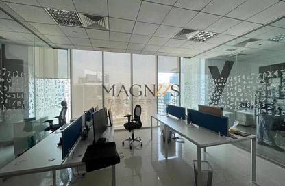 Office Space - Studio - 1 Bathroom for rent in The Prism - Business Bay - Dubai