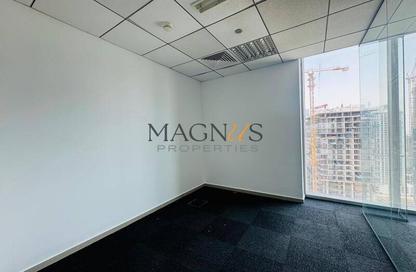 Office Space - Studio - 1 Bathroom for rent in The Prism - Business Bay - Dubai