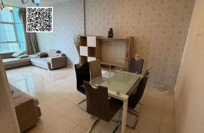 شقة - غرفة نوم - 2 حمامات للايجار في أورينت تاور 1 - أورينت تاور - البستان - عجمان