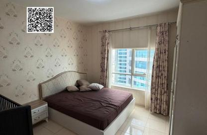 شقة - غرفة نوم - 2 حمامات للايجار في أورينت تاور 1 - أورينت تاور - البستان - عجمان