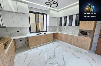 Villa - 4 Bedrooms - 6 Bathrooms for sale in Al Zaheya Gardens - Al Zahya - Ajman