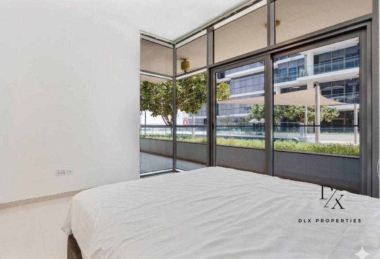 Furnished 2BR Apartment | Pool & Park Views | Lore photo 4
