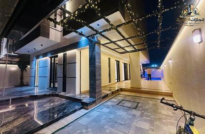 Villa - 5 - 7 for sale in Al Helio Downtown - Al Helio - Ajman Villa - 5 - 7 for sale in Al Helio Downtown - Al Helio - Ajman