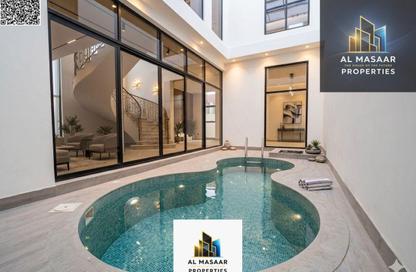Villa - 5 Bedrooms - 7 Bathrooms for sale in Al Maha Village - Al Zahya - Ajman