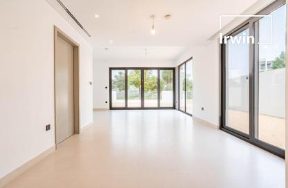 Villa - 4 - 5 for sale in Aura Gardens - Tilal Al Ghaf - Dubai