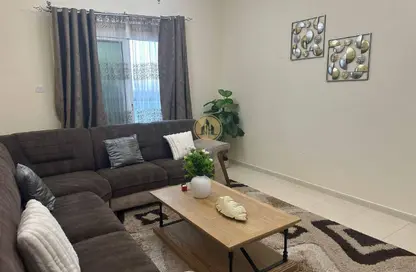 Apartment - 1 Bedroom - 2 Bathrooms for sale in Orient Tower 1 - Orient Towers - Al Bustan - Ajman