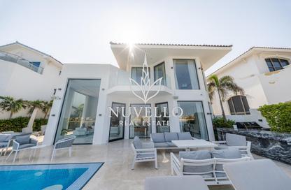 Villa - 4 - 6 for rent in Garden Homes Frond D - Garden Homes - Palm Jumeirah - Dubai