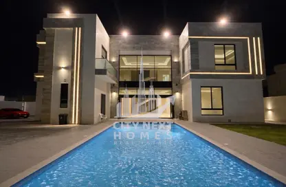 Villa - 5 Bedrooms - 7 Bathrooms for rent in Wadi Alshabak - Dubai