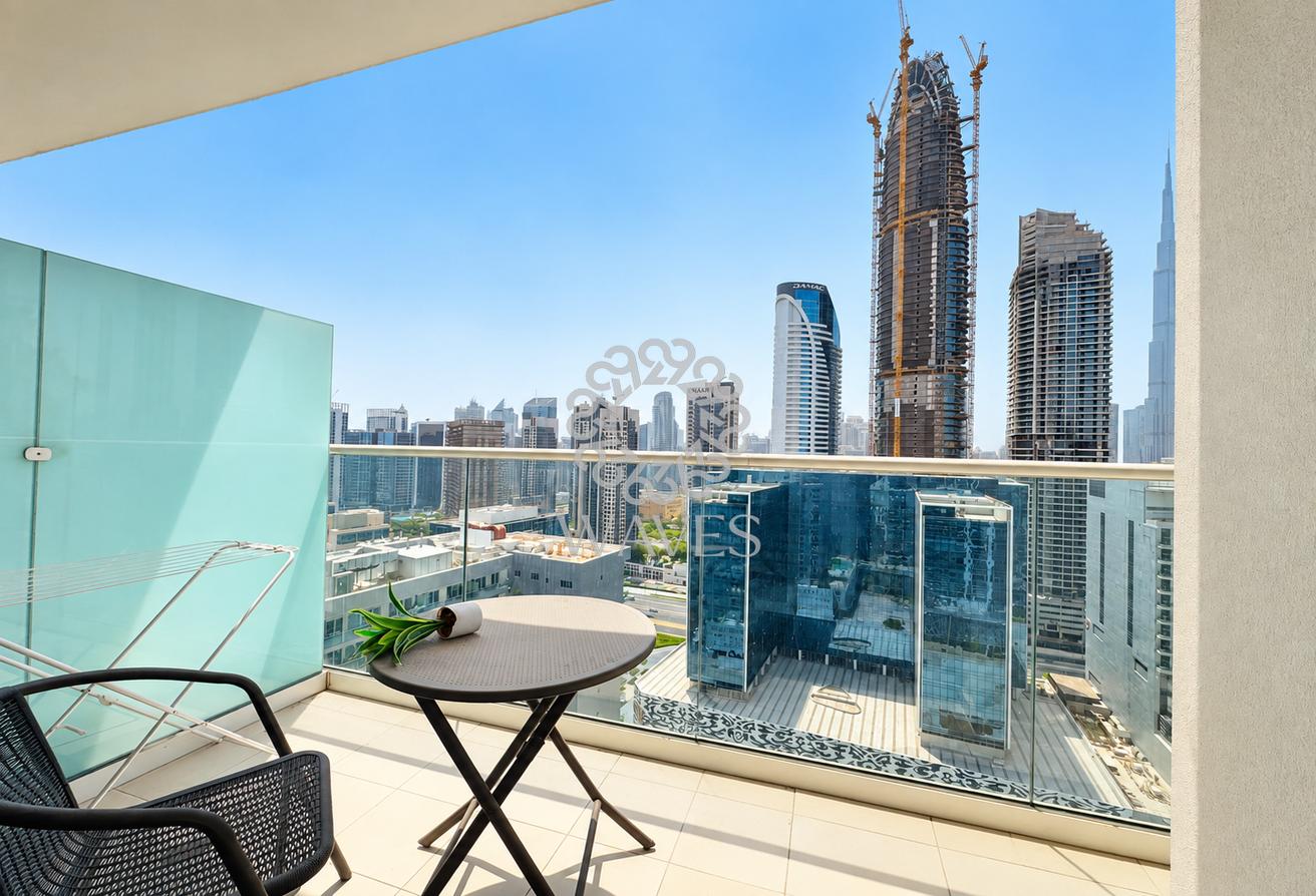 1BR | Canal & Burj Khalifa View | Vera photo 8