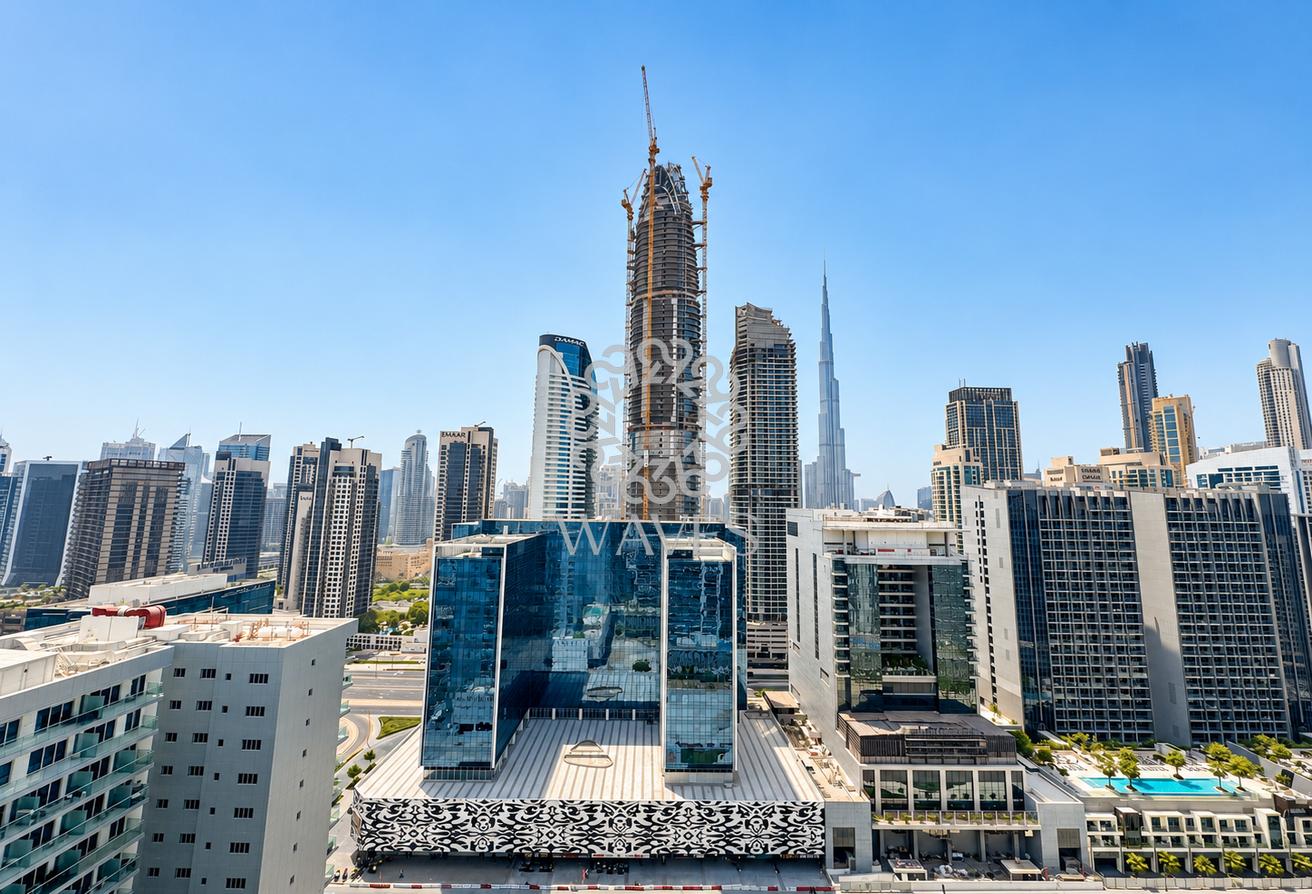1BR | Canal & Burj Khalifa View | Vera photo 11