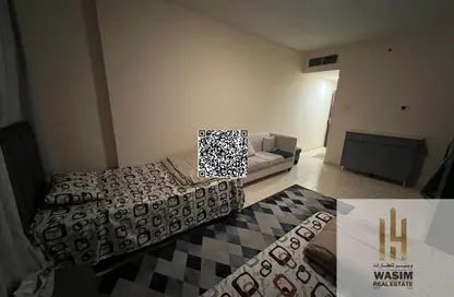 شقة - غرفة نوم - 2 حمامات للبيع في أورينت تاور 1 - أورينت تاور - البستان - عجمان