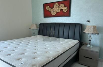 Apartment - 1 - 2 for sale in Miraclz Tower by Danube - Arjan - Dubai