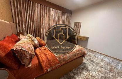 شقة - غرفة نوم - 2 حمامات للبيع في أورينت تاور 1 - أورينت تاور - البستان - عجمان