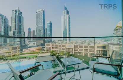 شقة - 2 غرف نوم - 2 حمامات للايجار في برج التاج - وسط مدينة دبي - دبي