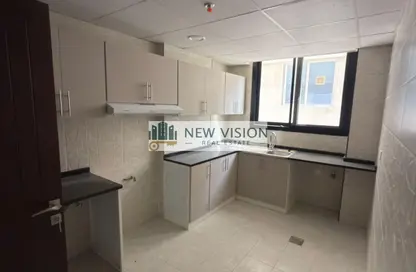 شقة - غرفة نوم - 2 حمامات للايجار في الزاهية - تجارية مويلح - الشارقة