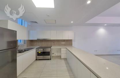 Townhouse - 4 - 4 for rent in Intima Villas - Victory Heights - Dubai Sports City - Dubai