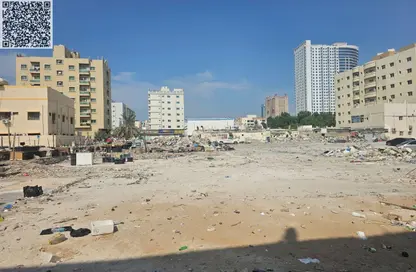 أرض - استوديو للبيع في بناية الشرفاء 1 - الرميلة 1 - عجمان