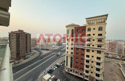 Apartment - 1 - 2 for rent in Global Green View 2 - CBD (Central Business District) - International City - Dubai