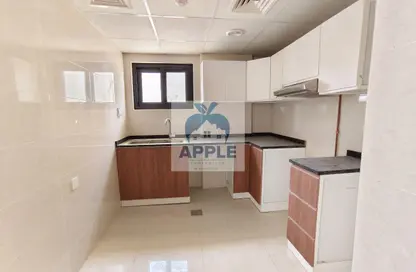 شقة - غرفة نوم - 2 حمامات للايجار في الزاهية 1 - الزاهية - تجارية مويلح - الشارقة