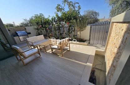 Villa - 3 Bedrooms - 4 Bathrooms for sale in Aura Gardens - Tilal Al Ghaf - Dubai