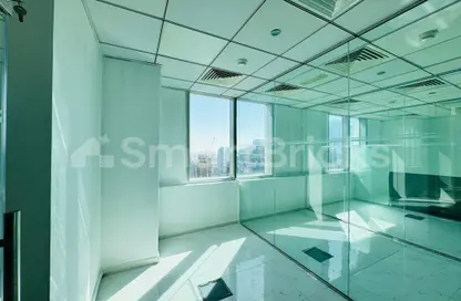 Office Space - Studio - 1 Bathroom for rent in The Prism - Business Bay - Dubai