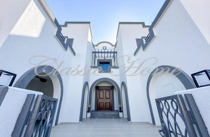 Villa - 4 Bedrooms - 6 Bathrooms for sale in Western Residence South - Falcon City of Wonders - Dubai