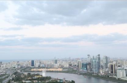 Half Floor - 6 Bedrooms - 7+ Bathrooms for sale in Blue Tower - Al Majaz 3 - Al Majaz - Sharjah
