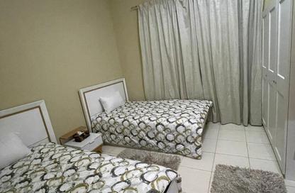 Apartment - 2 Bedrooms - 2 Bathrooms for rent in Orient Tower 1 - Orient Towers - Al Bustan - Ajman