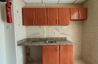 Apartment - Studio - 1 Bathroom for rent in Building IC1-EMR-06 - Emirates Cluster - International City - Dubai